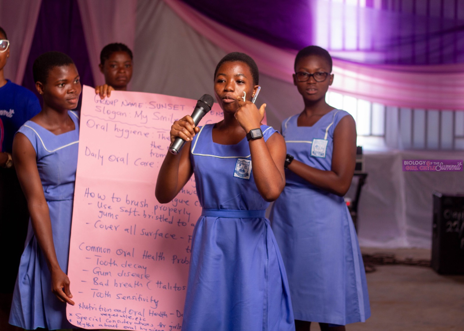 A student presents on mental wellbeing at a GIMAT summit